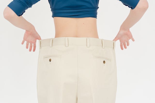 Woman wearing extra large pants